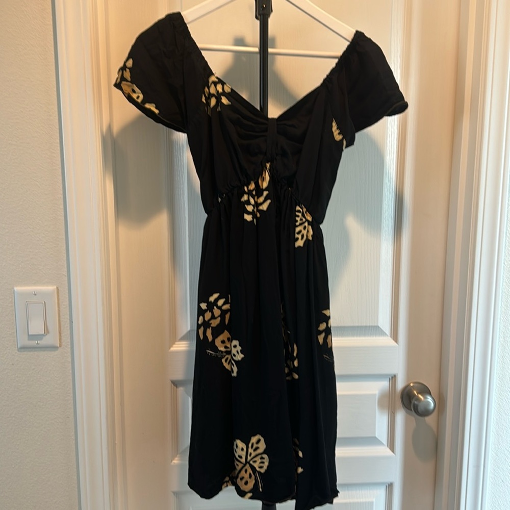 100% rayon black dress with hibiscus flowers. M/L